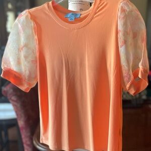 “CeCe” Vibrant Orange Blouse with Short Puffed Sleeves.
Size S
